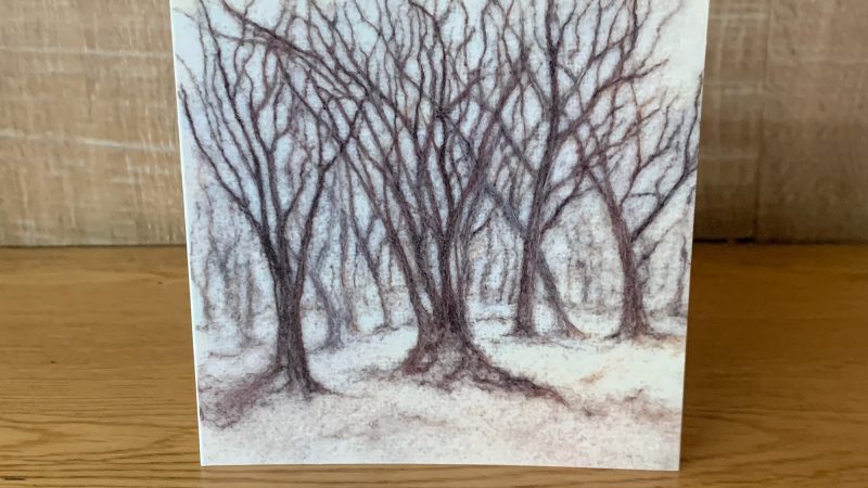 Greetings card showing a needle felted picture called 'Woodland' by Annie Brown